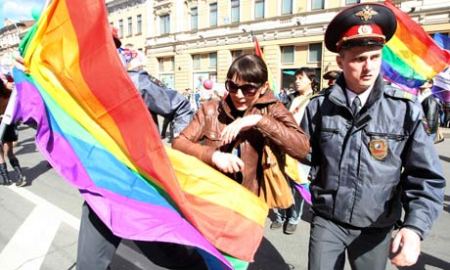 Police detain a gay rights activist in St Petersburg