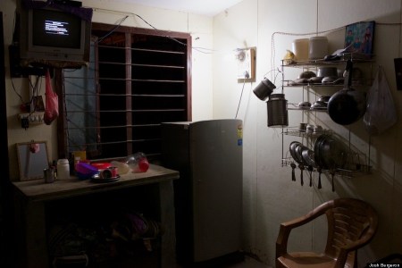 Inside a room at the Anand Parbat temporary resettlement colony.