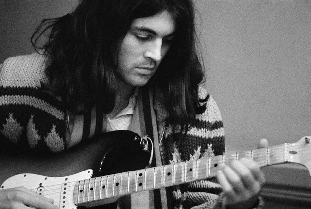 Singer Ian Gillan of  Playing Guitar