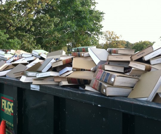 law-books-in-dumpster
